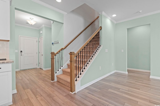 597 Heritage Downs Dr, Conway, SC 29526 - stairs with wood finished floors, ornamental molding, and recessed lighting
