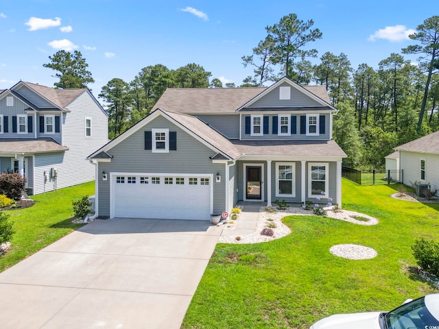 597 Heritage Downs Dr, Conway, SC 29526 - traditional-style home featuring a garage, driveway, a porch, and roof with shingles