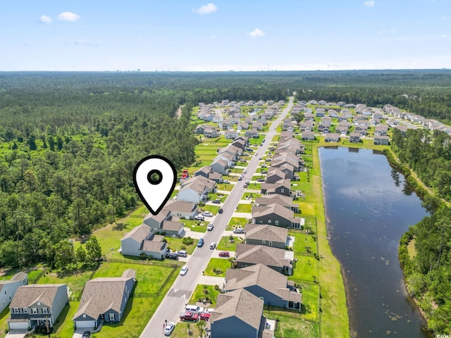 597 Heritage Downs Dr, Conway, SC 29526 - aerial view of residential area featuring a forest and a nearby body of water