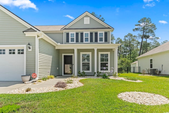 597 Heritage Downs Dr, Conway, SC 29526 - traditional-style house featuring a garage and covered porch