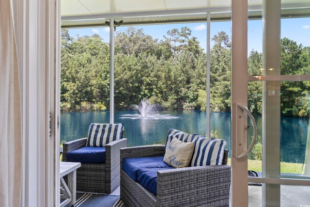236 Palm Cove Cir, Myrtle Beach, SC 29588 - sunroom / solarium featuring a water view and view of scattered trees