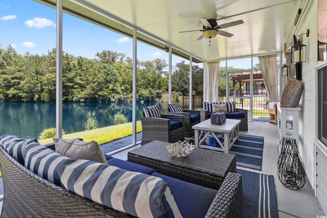 236 Palm Cove Cir, Myrtle Beach, SC 29588 - sunroom / solarium with outdoor lounge area, ceiling fan, a water view, and view of scattered trees