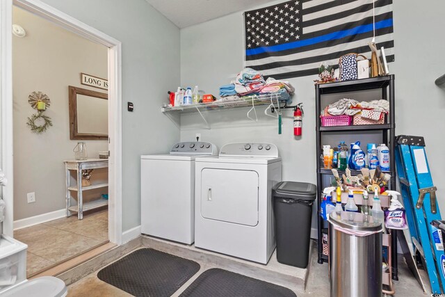 236 Palm Cove Cir, Myrtle Beach, SC 29588 - laundry area featuring washer and dryer and tile patterned floors
