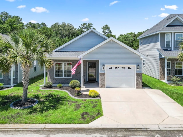 236 Palm Cove Cir, Myrtle Beach, SC 29588 - view of front of property with an attached garage, concrete driveway, and a front lawn