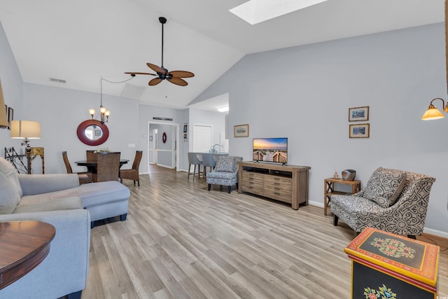 4520 Lighthouse Dr Unit 29B, Little River, SC 29566 - living area featuring a ceiling fan, a skylight, a chandelier, light wood-style floors, and high vaulted ceiling