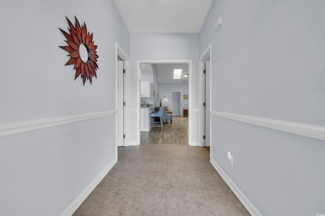 4520 Lighthouse Dr Unit 29B, Little River, SC 29566 - corridor featuring baseboards and tile patterned flooring