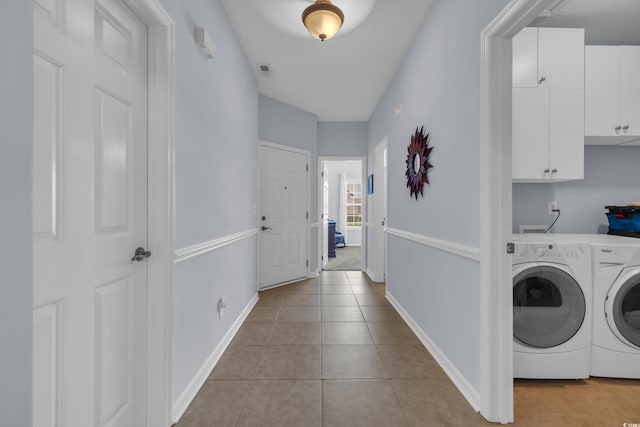 4520 Lighthouse Dr Unit 29B, Little River, SC 29566 - laundry area with cabinet space, independent washer and dryer, and tile patterned floors