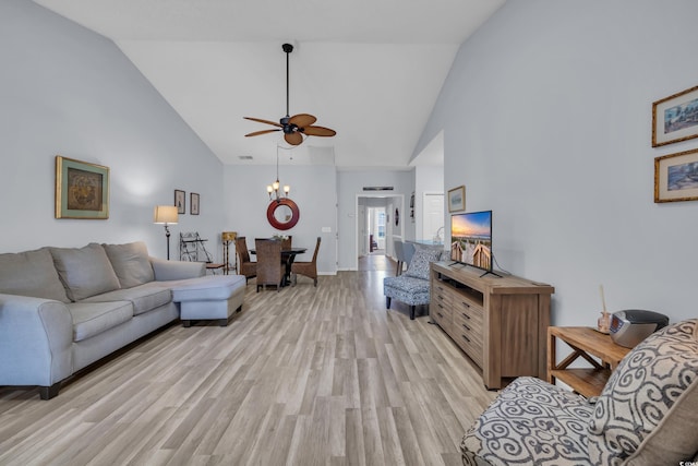 4520 Lighthouse Dr Unit 29B, Little River, SC 29566 - living room with high vaulted ceiling, light wood finished floors, a ceiling fan, and a chandelier