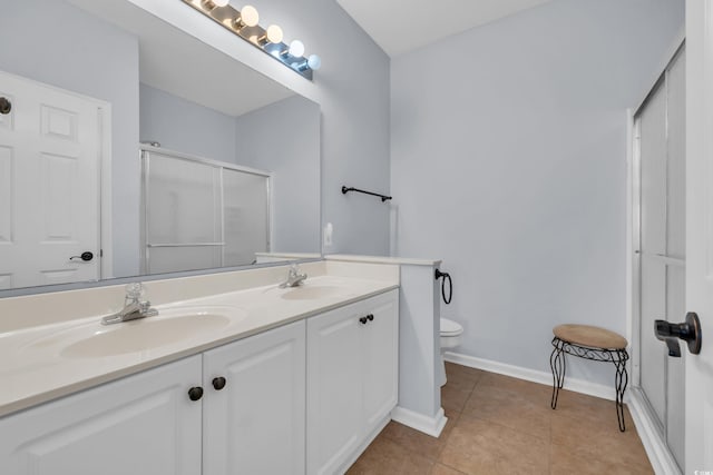 4520 Lighthouse Dr Unit 29B, Little River, SC 29566 - bathroom with double vanity, a shower with door, and tile patterned flooring