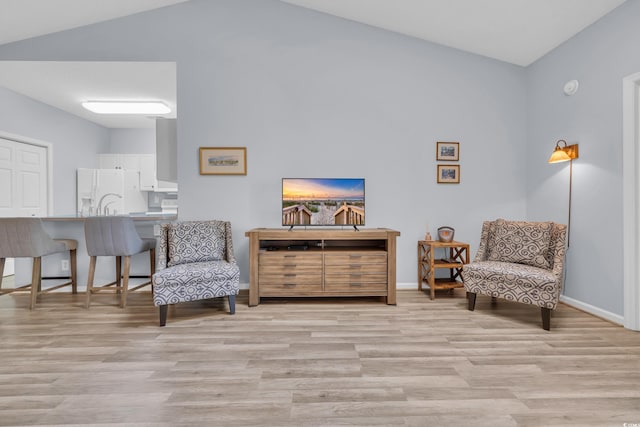 4520 Lighthouse Dr Unit 29B, Little River, SC 29566 - sitting room featuring light wood-type flooring and lofted ceiling