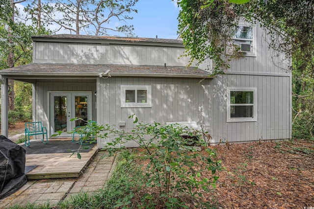 1930 Lake View Cir, Myrtle Beach, SC 29575 - rear view of house with french doors, a wooden deck, and roof with shingles