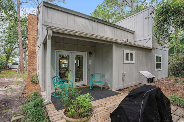 1930 Lake View Cir, Myrtle Beach, SC 29575 - rear view of property with a wooden deck and french doors