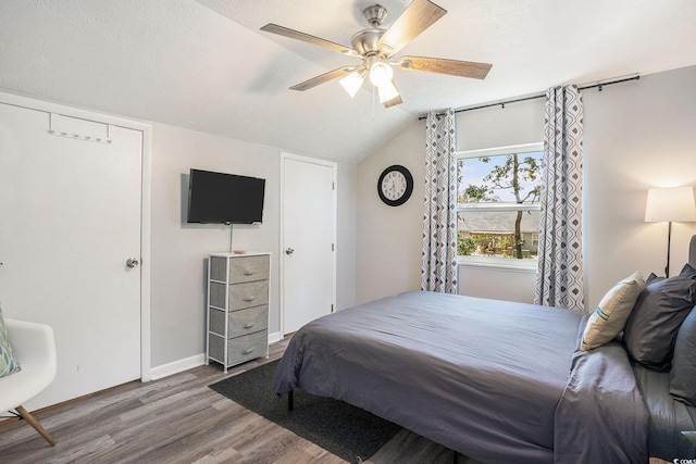 1930 Lake View Cir, Myrtle Beach, SC 29575 - bedroom with wood finished floors, lofted ceiling, and ceiling fan