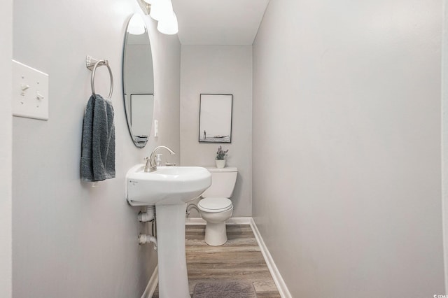 1930 Lake View Cir, Myrtle Beach, SC 29575 - half bathroom featuring wood finished floors and toilet