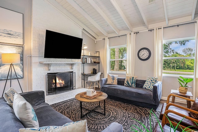 1930 Lake View Cir, Myrtle Beach, SC 29575 - living room with a brick fireplace, a wooden ceiling with exposed beams, wood finished floors, and high vaulted ceiling