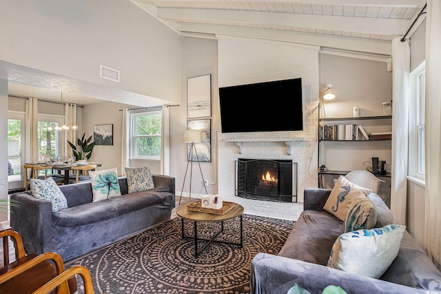1930 Lake View Cir, Myrtle Beach, SC 29575 - living room with a chandelier, a brick fireplace, and wood ceiling