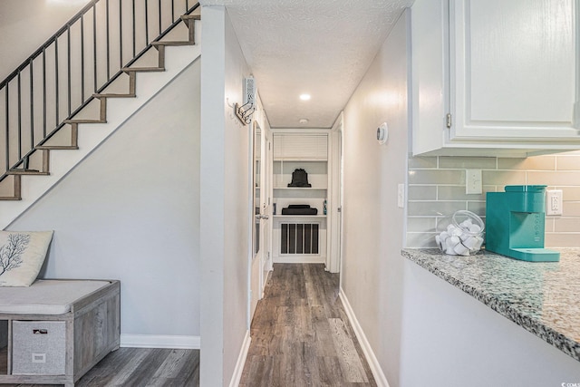 1930 Lake View Cir, Myrtle Beach, SC 29575 - corridor featuring dark wood finished floors, a textured ceiling, and stairs