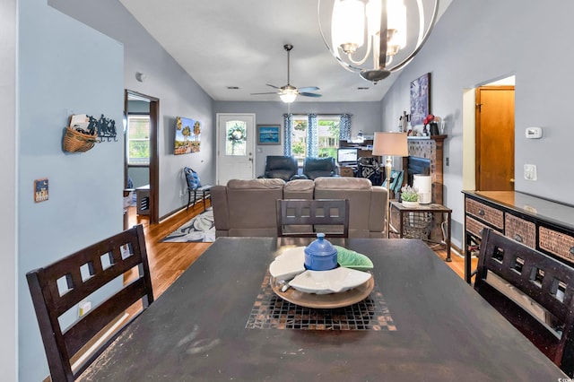 201 Surrey Ln, Myrtle Beach, SC 29579 - dining room with a chandelier, a ceiling fan, wood finished floors, and lofted ceiling