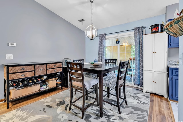 201 Surrey Ln, Myrtle Beach, SC 29579 - dining space featuring light wood-style floors and lofted ceiling