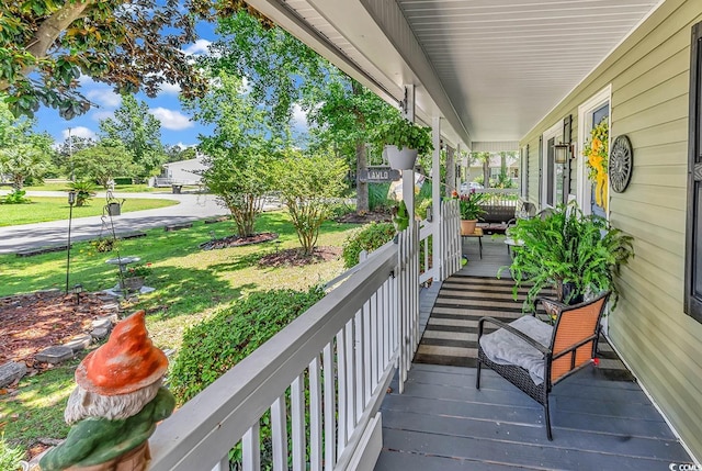 201 Surrey Ln, Myrtle Beach, SC 29579 - porch featuring a lawn