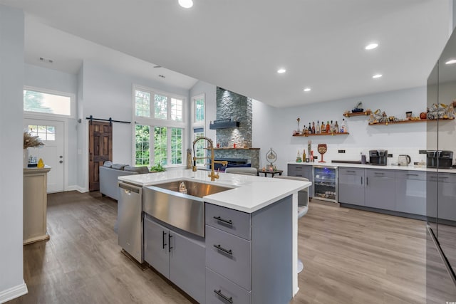35 Easter Lilly Ct, Murrells Inlet, SC 29576 - kitchen featuring gray cabinetry, beverage cooler, stainless steel dishwasher, open floor plan, and light countertops