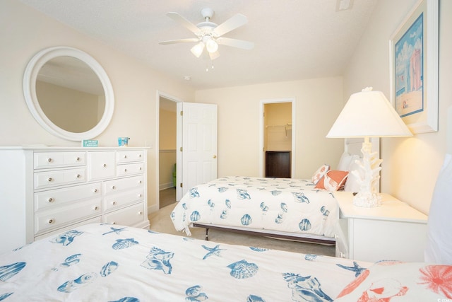 6172 Catalina Dr Unit 414H, North Myrtle Beach, SC 29582 - bedroom with light colored carpet and a ceiling fan