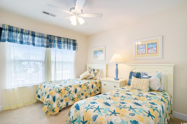 6172 Catalina Dr Unit 414H, North Myrtle Beach, SC 29582 - bedroom with multiple windows, carpet, and a ceiling fan