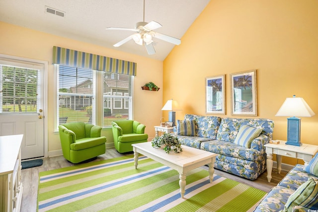 6172 Catalina Dr Unit 414H, North Myrtle Beach, SC 29582 - living room with wood finished floors, a ceiling fan, and high vaulted ceiling
