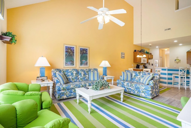 6172 Catalina Dr Unit 414H, North Myrtle Beach, SC 29582 - living area with a towering ceiling and ceiling fan