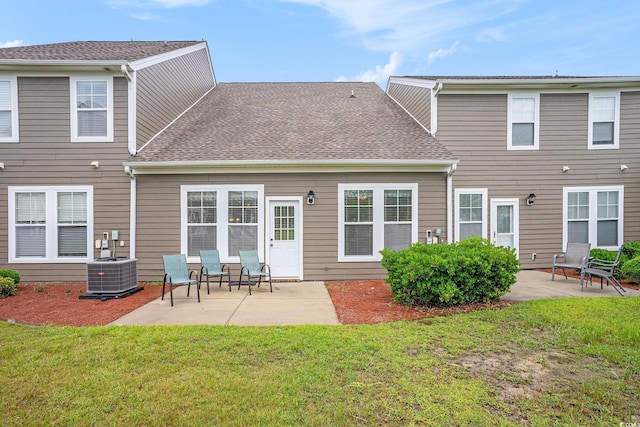 6172 Catalina Dr Unit 414H, North Myrtle Beach, SC 29582 - back of property with a patio and a lawn
