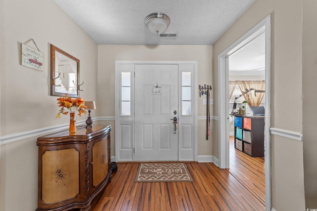 200 Silverbelle Blvd, Longs, SC 29568 - entrance foyer featuring wood-type flooring and a textured ceiling
