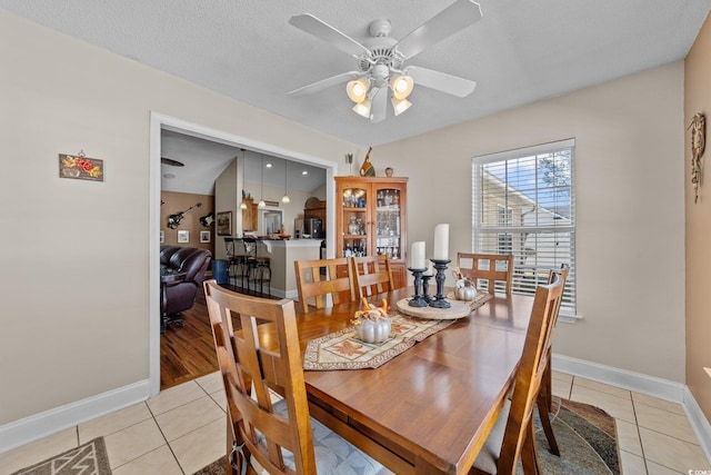 200 Silverbelle Blvd, Longs, SC 29568 - dining space with light tile patterned flooring, ceiling fan, and a textured ceiling