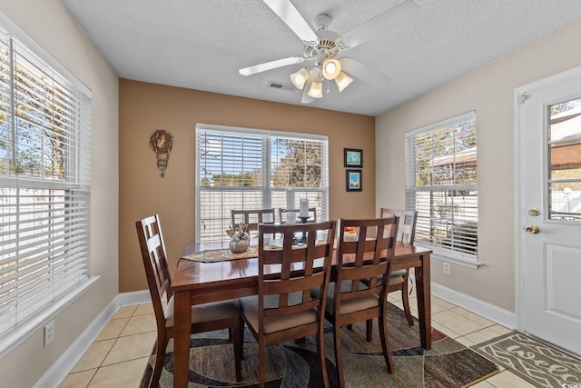 200 Silverbelle Blvd, Longs, SC 29568 - dining space featuring plenty of natural light, light tile patterned floors, a textured ceiling, and a ceiling fan