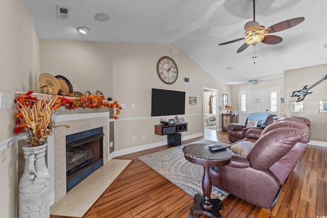 200 Silverbelle Blvd, Longs, SC 29568 - living room featuring a ceiling fan, a premium fireplace, wood finished floors, and high vaulted ceiling
