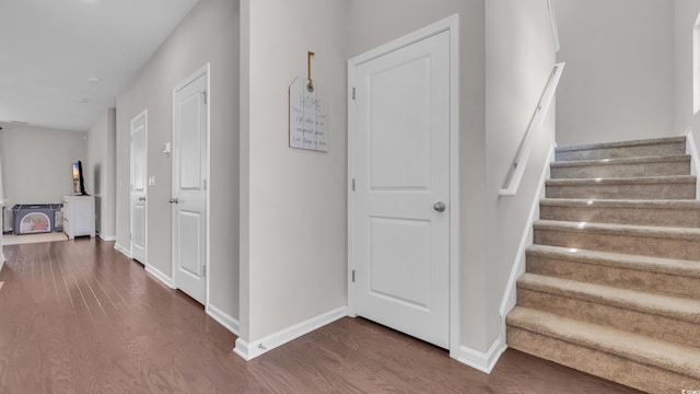 356 Ocean Commons Dr, Surfside Beach, SC 29575 - staircase featuring wood finished floors and baseboards