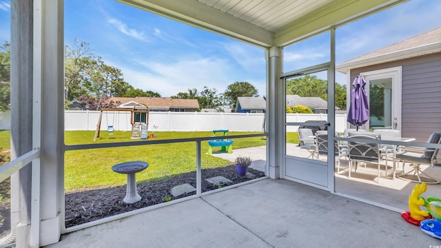 356 Ocean Commons Dr, Surfside Beach, SC 29575 - unfurnished sunroom with outdoor dining space