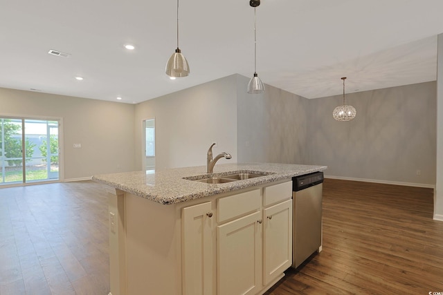 184 Sea Shell Dr Unit 12, Murrells Inlet, SC 29576 - kitchen featuring open floor plan, dishwasher, dark wood finished floors, a kitchen island with sink, and light stone countertops