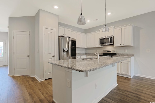 184 Sea Shell Dr Unit 12, Murrells Inlet, SC 29576 - kitchen featuring stainless steel appliances, dark wood finished floors, white cabinetry, and recessed lighting