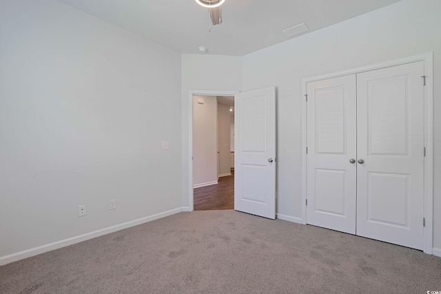 184 Sea Shell Dr Unit 12, Murrells Inlet, SC 29576 - unfurnished bedroom featuring carpet flooring, a closet, and ceiling fan