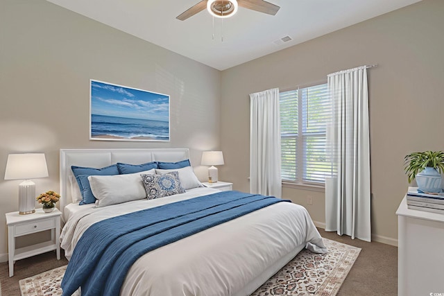 184 Sea Shell Dr Unit 12, Murrells Inlet, SC 29576 - carpeted bedroom with baseboards and a ceiling fan