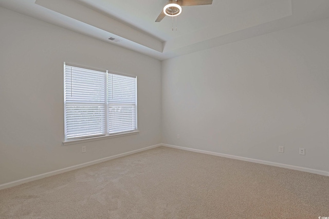 184 Sea Shell Dr Unit 12, Murrells Inlet, SC 29576 - unfurnished room featuring a ceiling fan, a raised ceiling, and carpet floors