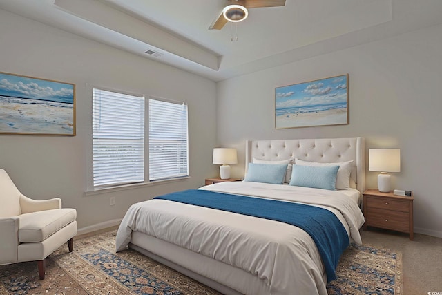 184 Sea Shell Dr Unit 12, Murrells Inlet, SC 29576 - bedroom with ceiling fan, a raised ceiling, and carpet flooring