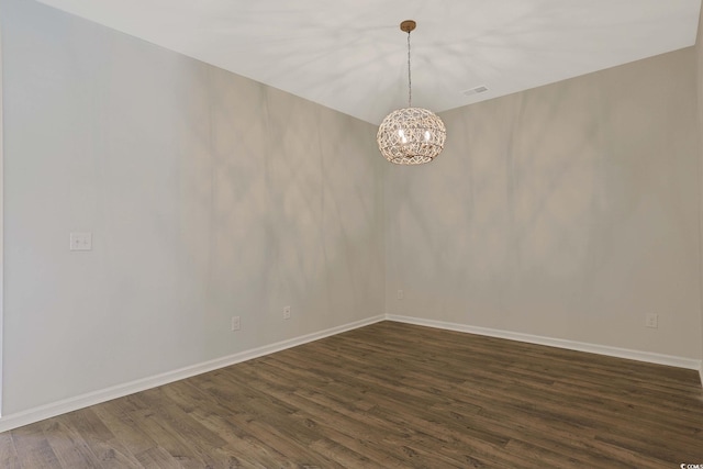 184 Sea Shell Dr Unit 12, Murrells Inlet, SC 29576 - unfurnished room with dark wood-style floors and a chandelier