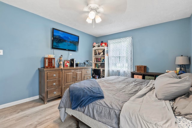 169 Ole Maple St, Loris, SC 29569 - bedroom with light wood-style flooring and ceiling fan