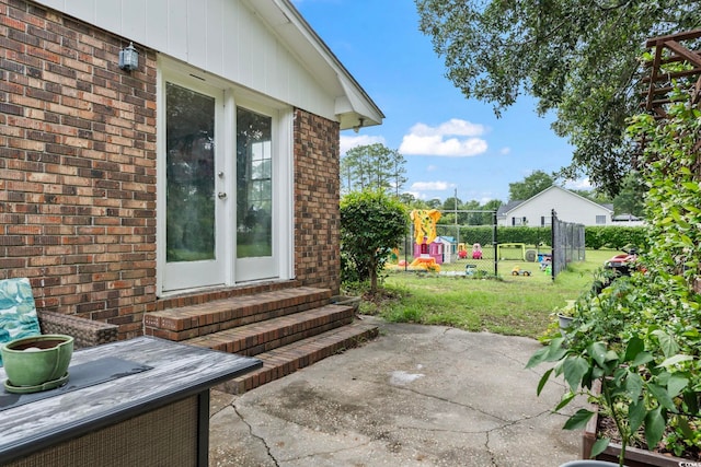 169 Ole Maple St, Loris, SC 29569 - view of patio featuring entry steps and a playground