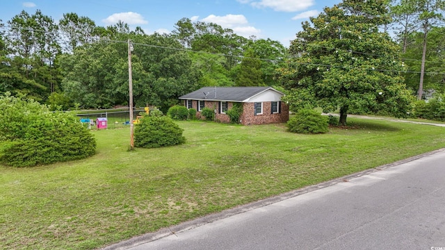 169 Ole Maple St, Loris, SC 29569 - ranch-style house featuring a front yard and brick siding