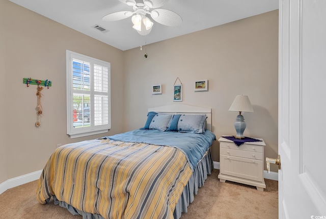 876 Palmetto Trl Unit 103, Myrtle Beach, SC 29577 - bedroom with light carpet and a ceiling fan