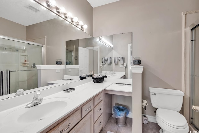 876 Palmetto Trl Unit 103, Myrtle Beach, SC 29577 - bathroom featuring tile patterned floors, a shower stall, and vanity