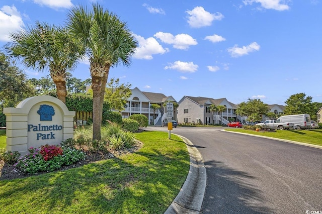 876 Palmetto Trl Unit 103, Myrtle Beach, SC 29577 - view of front of home with a residential view and a front yard