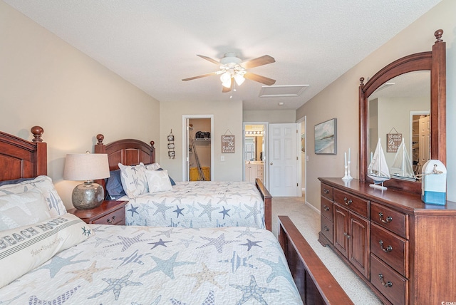 503 N 20th Ave N Unit 41D, North Myrtle Beach, SC 29582 - bedroom featuring a walk in closet, carpet, a closet, ceiling fan, and ensuite bathroom
